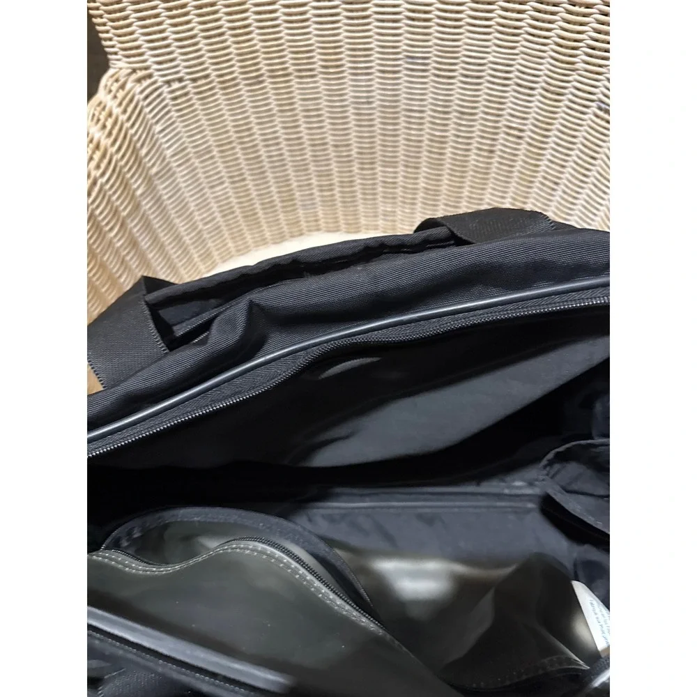 American Tourister Black Rolling Duffel Bag Travel Carry On Luggage Wheels